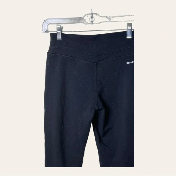 0507W. NIKE‎ DRI FIT MID RISE CAPRIS BLACK IN COLOR SZ SMALL EMBROIDERED LOGO - Picture 9 of 10